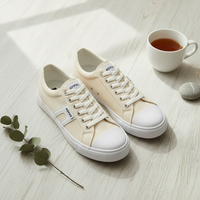 Cream canvas sneakers lifestyle